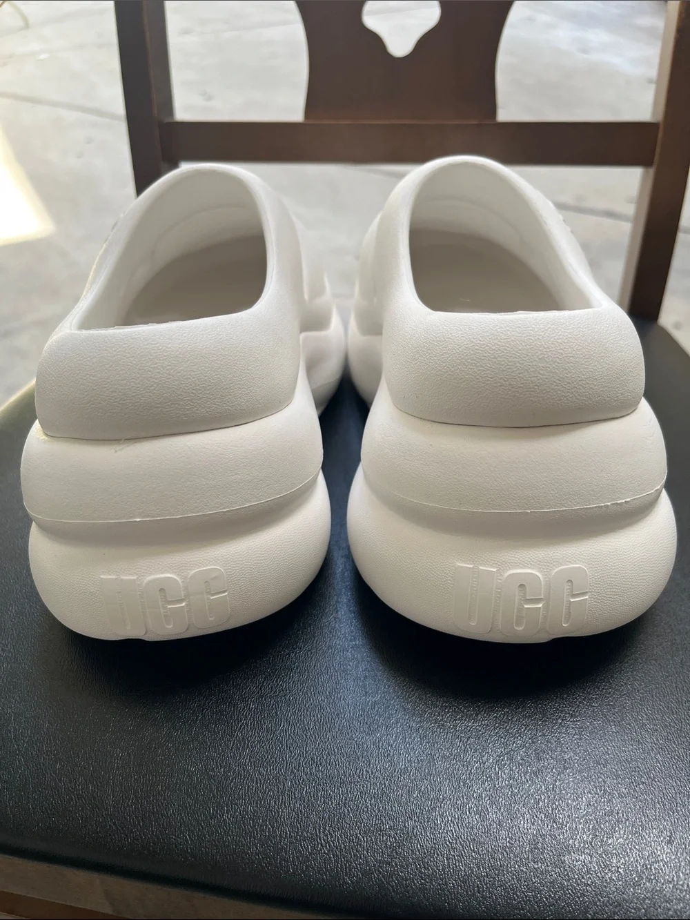 UGG women’s White Slip-On Foam Clog Sneakers